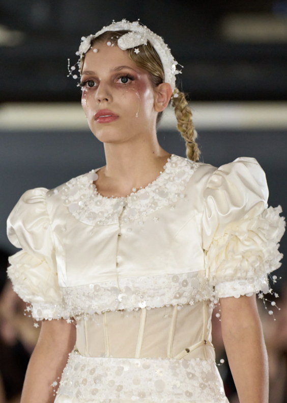 Ribbons, lace and a plaited crown