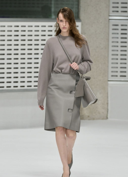 The flap edge again, on knitwear and a wrapped skirt