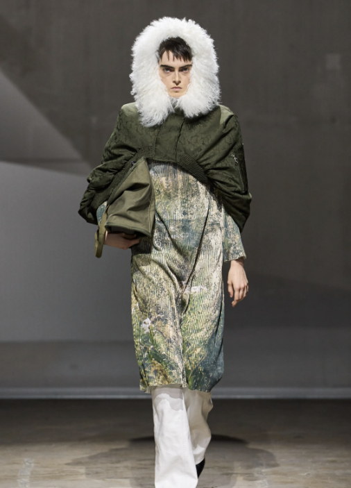 A khaki parka and a cloud of white fur