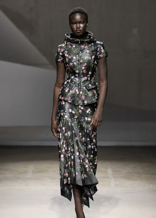 A dark floral gown, cut on the bias