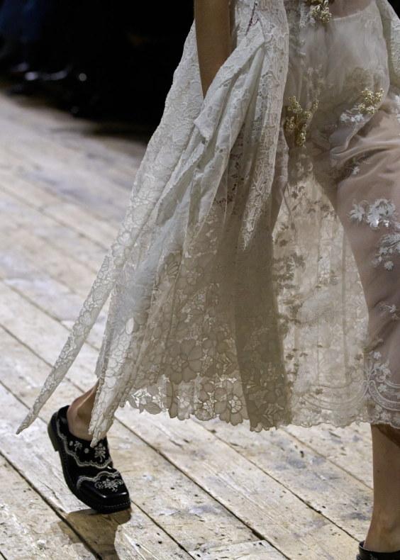 Lace trailing across the boards