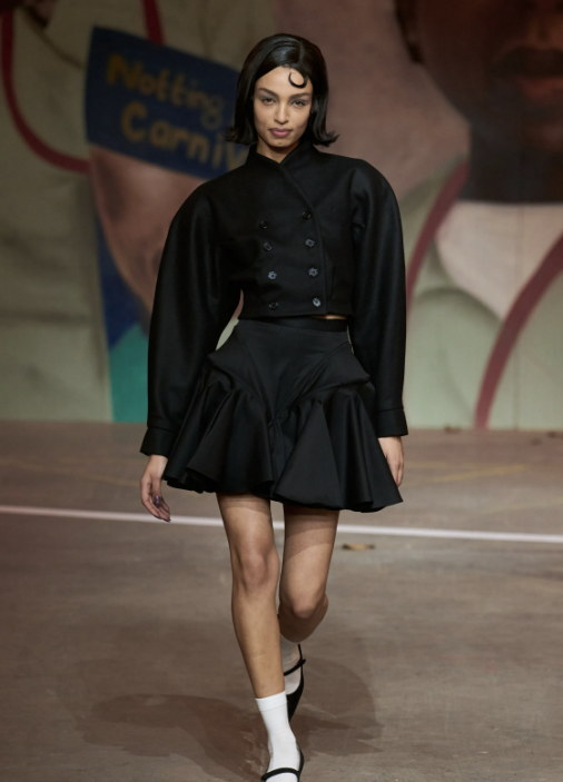 A cropped jacket and a swinging skirt